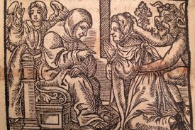 woodcut image of an angel and demon